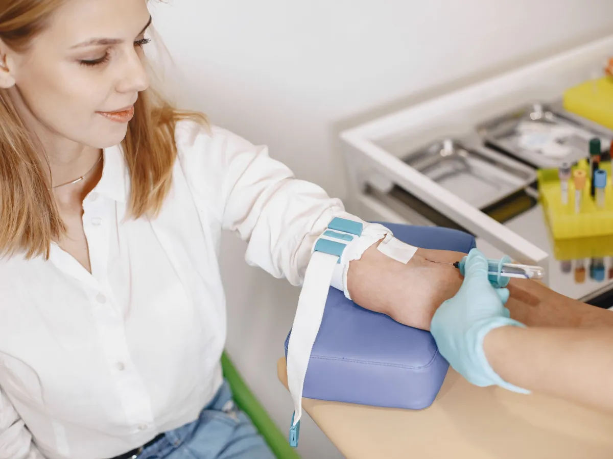 A blood sample being collected from a patient’s arm